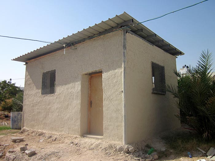 Visiting high school students to Al Auja made this Dorm out of mud as an example of a low impact, eco-home.