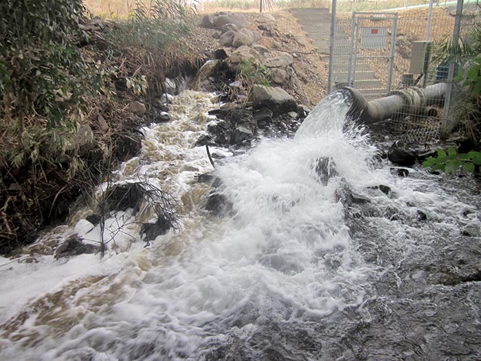 Sewage being directly dumped into the Jordan just below its headwaters from the Sea of Galilee.