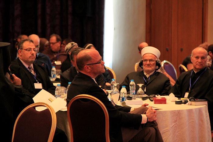 U.S. Deputy Assistant Secretary of State, Jerry White, sits with religious leaders from the region.