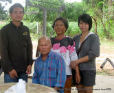 Post-Fieldwork Group Photo: Aek, Village Leader and His Wife, Ann